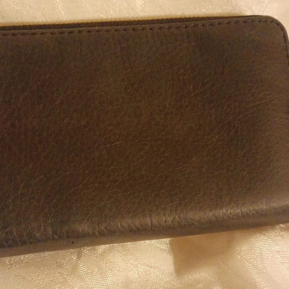 Michael Kors black pebbled leather accordion zippered wallet